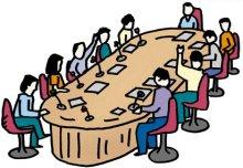 Fumetto che ritrae una serie di persone attorno ad un tavolo